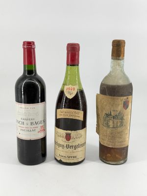 three bottles of wine sitting next to each other on a white surface