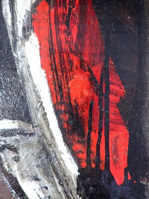 un gros plan sur un tableau représentant un homme coiffé d'un chapeau rouge