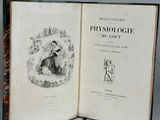 an open book with a picture of a woman in a dress on it
