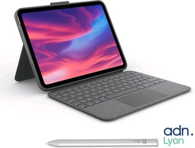an image of a laptop with a pen next to it