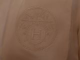 a close up of a jacket with a logo on it
