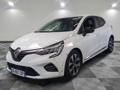 a white car is parked in a room with a checkered floor