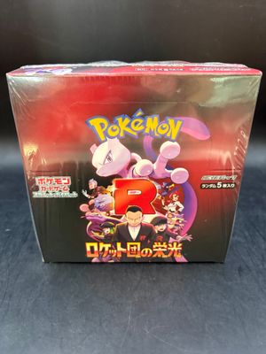 a close up of a box of pokemon cards on a table