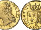a gold sovereign coin with a crown on top of it