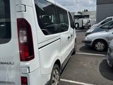 a white van that is parked in a parking lot