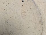 a close up view of a bowl with a hole in it