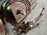a box with a bunch of wires on the ground next to a person