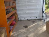 a white van that is parked in a lot