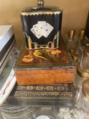 a glass table with a box on top of it with cards on it