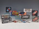 a lot of toy cars that are in a display case