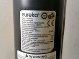 a close up of a black bottle with a label on it