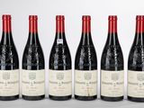 six bouteilles de vin rouge alignées