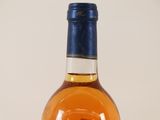 a bottle of alcohol that is sitting on a table