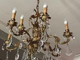 a chandelier that is hanging from the ceiling