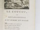 an open book with a picture of a man and a dog on it