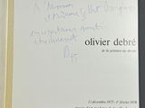 a book with writing on it sitting on a table