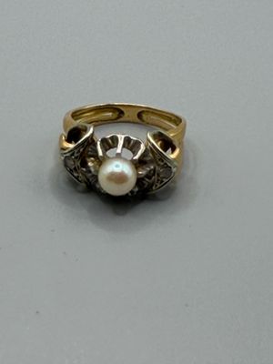 une image représentant une bague sertie d'une perle