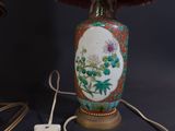 a lamp that is sitting on a table next to a lamp