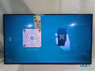 a tv screen with a picture of a smart phone on it