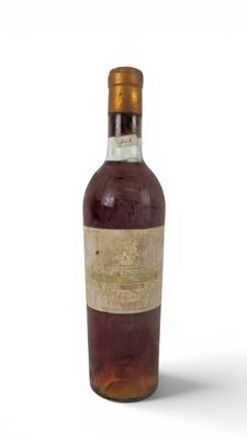 une image représentant une bouteille d'alcool avec une étiquette dessus