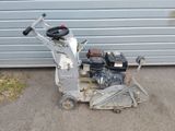 a small machine that is sitting on the ground