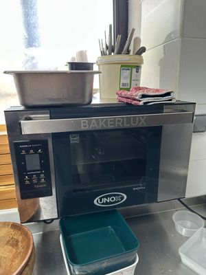 a microwave that is sitting on a counter in a kitchen