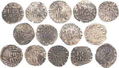 a group of silver coins with the names of different countries