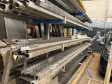 an image of a warehouse filled with lots of metal items