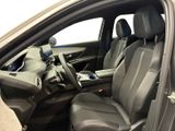 the interior of a car with the door open and the driver ' s seat up