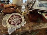 a cake on a table with a picture and a pair of shoes