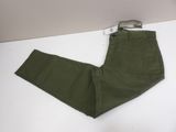 a close up of a pair of green pants on a table