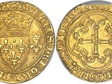 a gold coin with a coat of arms on it