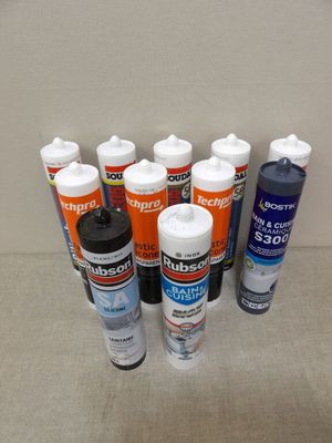 many different types of glues on the table
