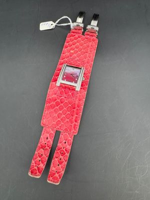 wrist watch made of red leather with a silver case