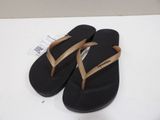 pair of black and tan flip flop flop flop flop flop flop flop flop flop flop flop flop flop flop flop