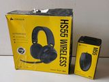 a box with a pair of headphones sitting on top of it