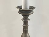 a candle that is sitting on top of a table