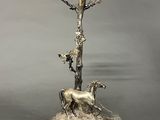 an image of a lamp post with a horse and a dog on it