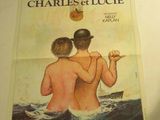 une photo d'une affiche de film représentant un homme et une femme dans l'eau