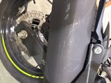 a close up of the front wheel of a motorcycle