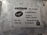 a close up of a metal plate with a sign on it