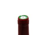 a bottle of wine that is sitting on a table