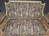 a couch that is sitting on a hard wood floor