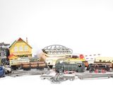 a lot of toy trains that are sitting on a table