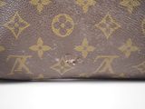 a close up of a brown louis vuitton bag