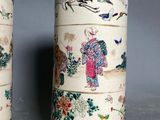 pair of chinese vases with birds and flowers on them