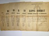 three old newspaper pages are hanging on a wall in a room