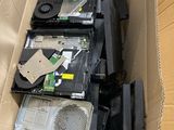 a cardboard box with a bunch of computer parts inside of it