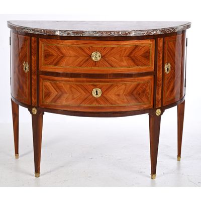 an image of a wooden chest of drawers with marble top