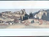 une photo d'un tableau représentant un paysage de montagne, dans un cadre